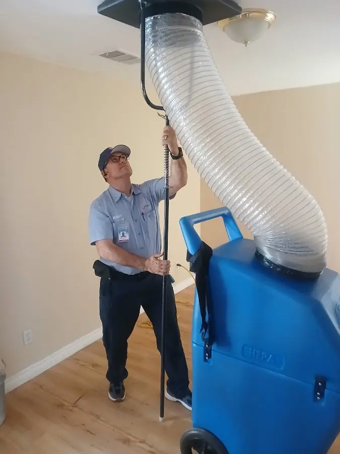 HVAC Installation technician using HEPA equipment in Locust